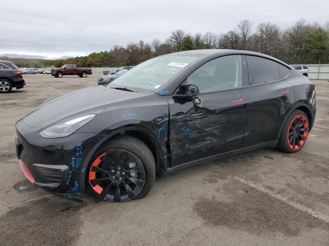 TESLA MODEL Y 2023 con VIN 7SAYGAEE5PF926448 - Foto de la subasta