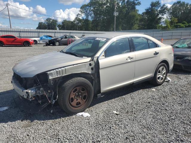FORD TAURUS POL 2014 with VIN 1FAHP2MKXEG143788 - Photo from auction