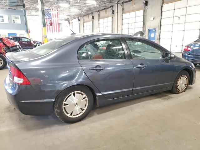 Photo 3 from auction – 2010 HONDA CIVIC HYBR with VIN JHMFA3F27AS006125