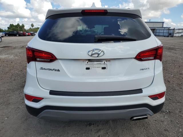 Photo 6 from auction – 2018 HYUNDAI SANTA FE S with VIN 5NMZU3LB0JH102992