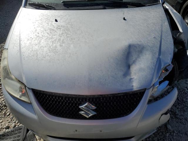 Photo 11 from auction – 2013 SUZUKI SX4 LE with VIN JS2YC5A31D6100472