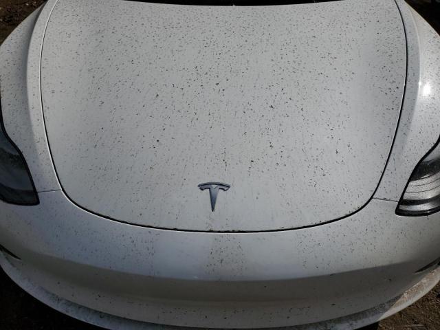 Photo 11 from auction – 2023 TESLA MODEL 3 with VIN 5YJ3E1EA5PF681841
