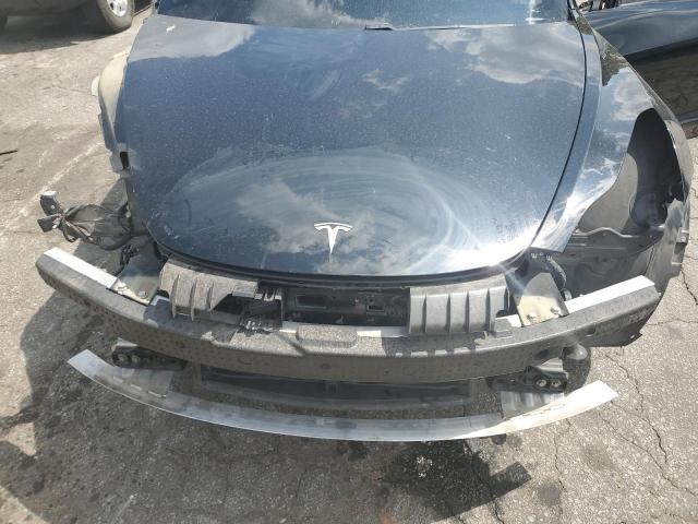 Photo 11 from auction – 2021 TESLA MODEL 3 with VIN 5YJ3E1EA1MF996017