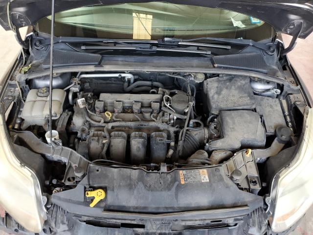 Photo 11 from auction – 2014 FORD FOCUS S with VIN 1FADP3E21EL282590