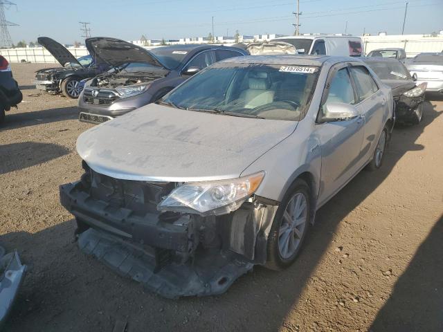 TOYOTA CAMRY HYBR 2012 with VIN 4T1BD1FK5CU008325 - Photo from auction