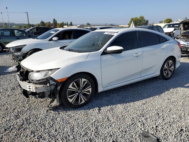 HONDA CIVIC EX 2017 with VIN 2HGFC1F3XHH658149 - Photo from auction