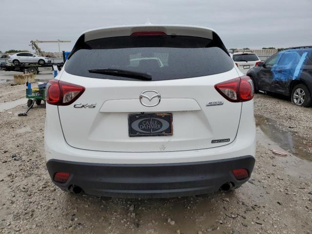 Photo 6 from auction – 2015 MAZDA CX-5 TOURI with VIN JM3KE2CY9F0475847