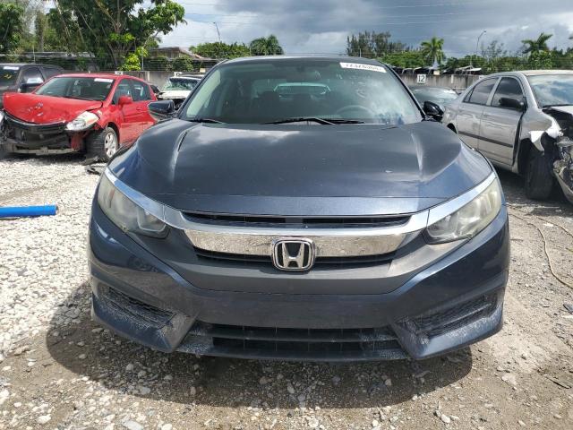 Photo 5 from auction – 2016 HONDA CIVIC LX with VIN 19XFC2F57GE066093