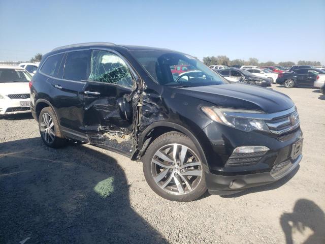 Photo 4 from auction – 2017 HONDA PILOT ELIT with VIN 5FNYF6H02HB089026