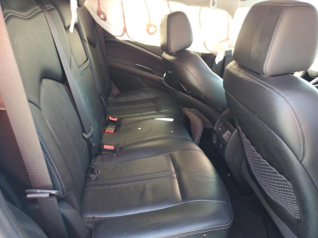 Photo 11 from auction – 2013 CADILLAC SRX PERFOR with VIN 3GYFNHE30DS625889