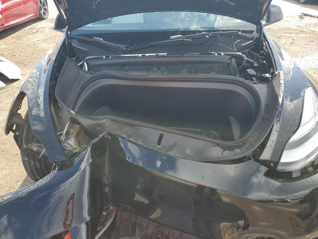 Photo 11 from auction – 2023 TESLA MODEL Y with VIN 7SAYGDEE0PF608352