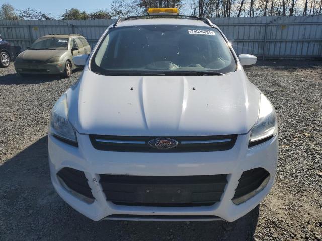 Photo 5 from auction – 2016 FORD ESCAPE SE with VIN 1FMCU9GX7GUB16643