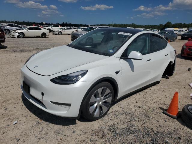 TESLA MODEL Y 2023 with VIN 7SAYGDEE7PA148264 - Photo from auction