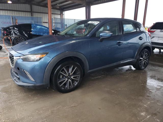 MAZDA CX-3 TOURI 2018 with VIN JM1DKDC72J0300216 - Photo from auction