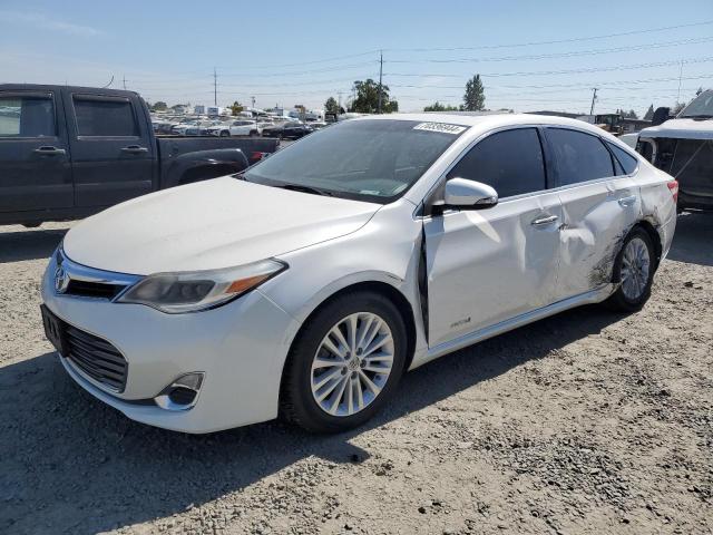 TOYOTA AVALON HYB 2014 with VIN 4T1BD1EB4EU031017 - Photo from auction