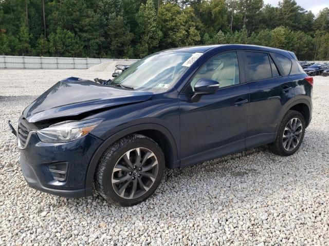 MAZDA CX-5 GT 2016 with VIN JM3KE4DY2G0917864 - Photo from auction