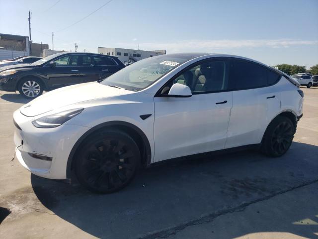 TESLA MODEL Y 2023 with VIN 7SAYGAEE7PF751927 - Photo from auction