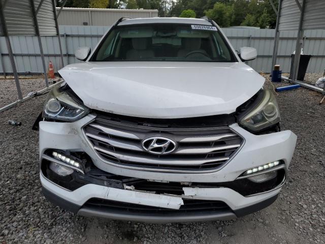 Photo 5 from auction – 2017 HYUNDAI SANTA FE S with VIN 5NMZU3LB5HH027250