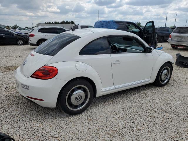 Photo 3 from auction – 2013 VOLKSWAGEN BEETLE with VIN 3VWJX7AT5DM601857