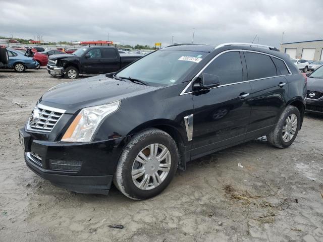 CADILLAC SRX LUXURY 2014 with VIN 3GYFNBE34ES664693 - Photo from auction