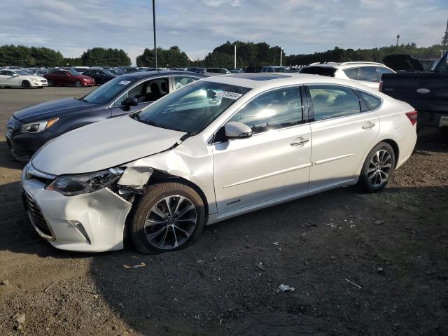 TOYOTA AVALON HYB 2016 with VIN 4T1BD1EBXGU053705 - Photo from auction