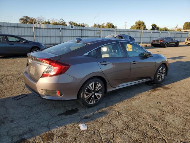 Photo 3 from auction – 2016 HONDA CIVIC EX with VIN 2HGFC1F36GH643307
