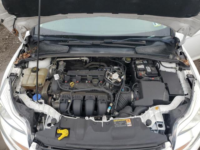Photo 11 from auction – 2014 FORD FOCUS S with VIN 1FADP3E20EL245093