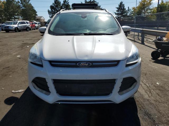 Photo 5 from auction – 2016 FORD ESCAPE TIT with VIN 1FMCU9J96GUC25539
