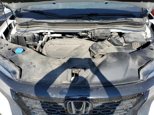 Photo 12 from auction – 2021 HONDA PASSPORT E with VIN 5FNYF8H03MB014714