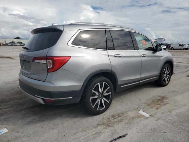 Photo 3 from auction – 2021 HONDA PILOT TOUR with VIN 5FNYF5H92MB033378