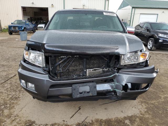 Photo 5 from auction – 2012 HONDA RIDGELINE with VIN 5FPYK1F50CB452162
