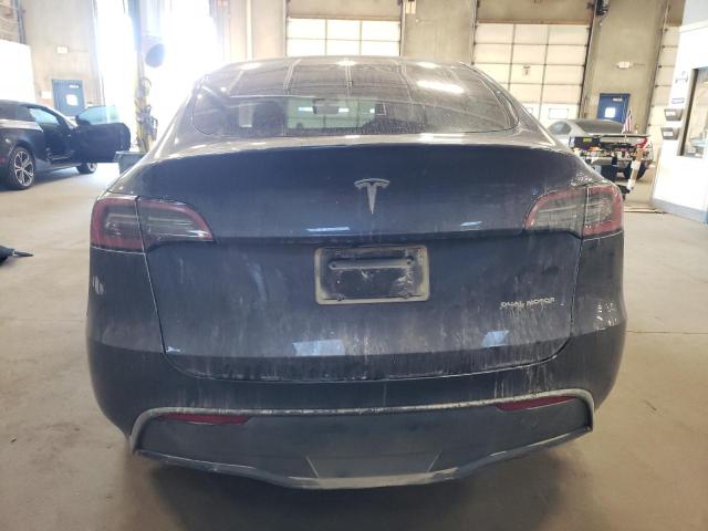 Photo 6 from auction – 2023 TESLA MODEL Y with VIN 7SAYGAEE6PF950113