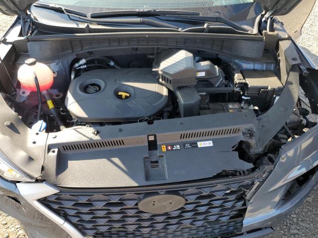 Photo 12 from auction – 2021 HYUNDAI TUCSON SE with VIN KM8J2CA41MU386357
