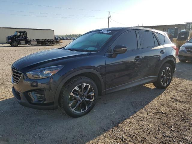 MAZDA CX-5 GT 2016 with VIN JM3KE4DY6G0893777 - Photo from auction
