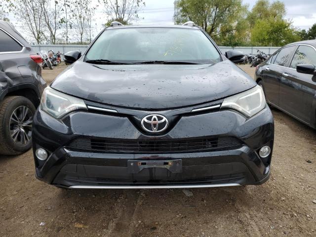 Photo 5 from auction – 2016 TOYOTA RAV4 XLE with VIN 2T3WFREV0GW257943