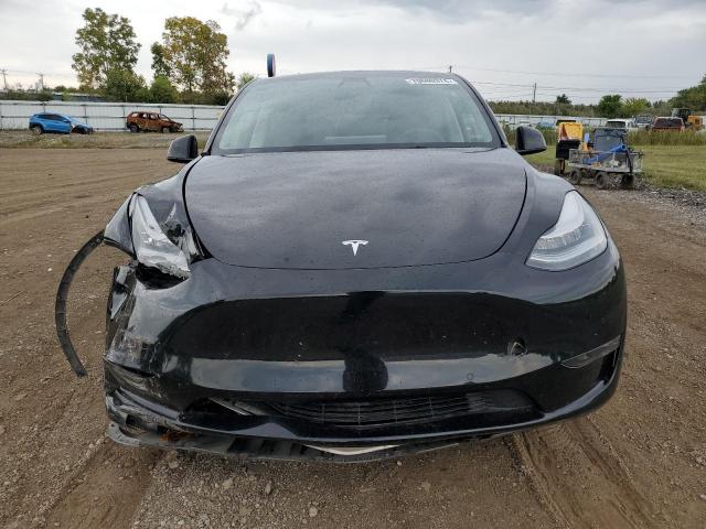 Photo 5 from auction – 2021 TESLA MODEL Y with VIN 5YJYGAEE9MF187688