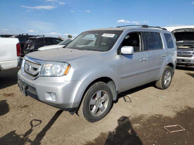 HONDA PILOT EXL 2011 with VIN 5FNYF4H69BB016140 - Photo from auction