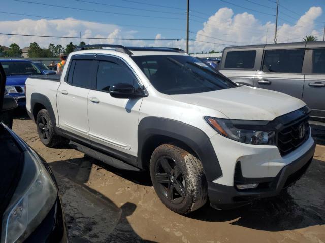 Photo 4 from auction – 2023 HONDA RIDGELINE with VIN 5FPYK3F83PB056416