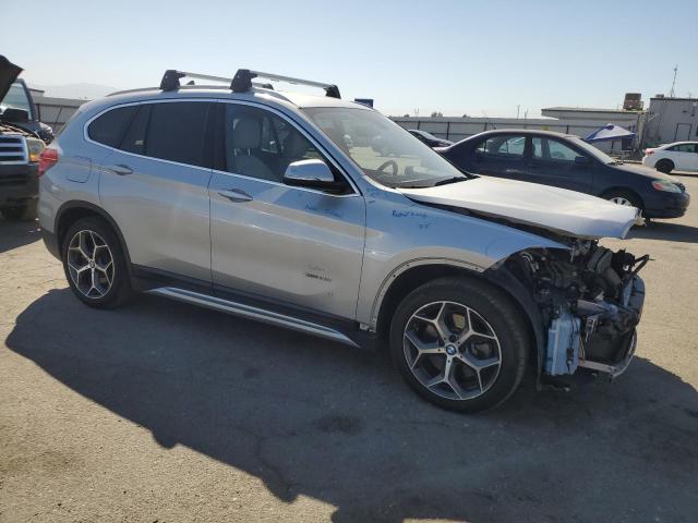 Photo 4 from auction – 2017 BMW X1 XDRIVE2 with VIN WBXHT3C36H5F74477