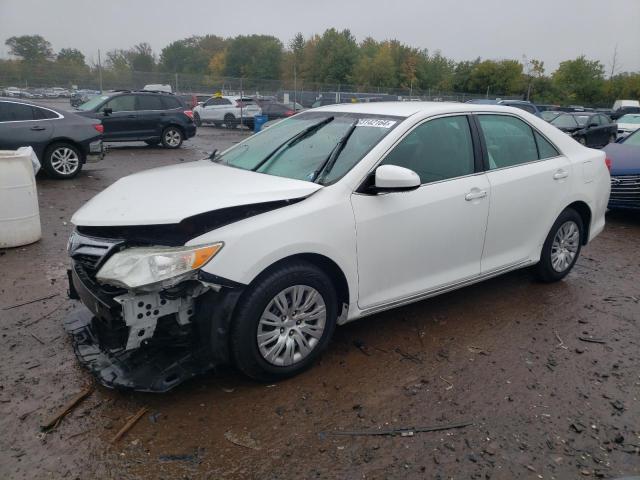 TOYOTA CAMRY L 2014 with VIN 4T4BF1FK8ER361676 - Photo from auction