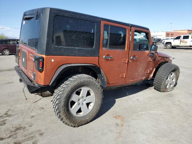 Photo 3 from auction – 2011 JEEP WRANGLER U with VIN 1J4BA5H19BL588797