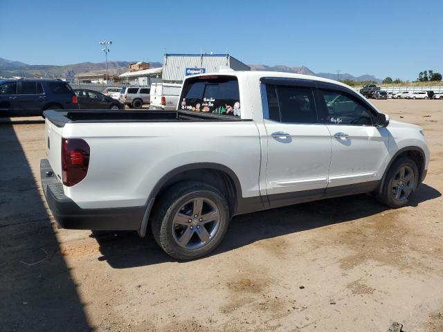 Photo 3 from auction – 2022 HONDA RIDGELINE with VIN 5FPYK3F77NB003884