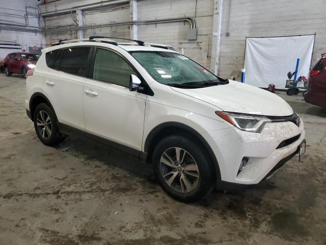 Photo 4 from auction – 2016 TOYOTA RAV4 XLE with VIN JTMWFREV1GJ074565