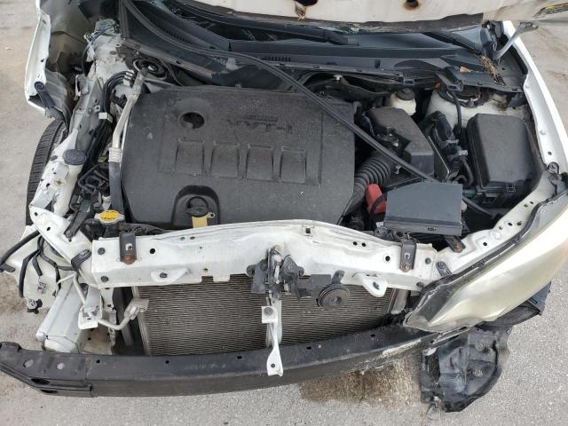 Photo 11 from auction – 2014 TOYOTA COROLLA L with VIN 5YFBURHE8EP146497