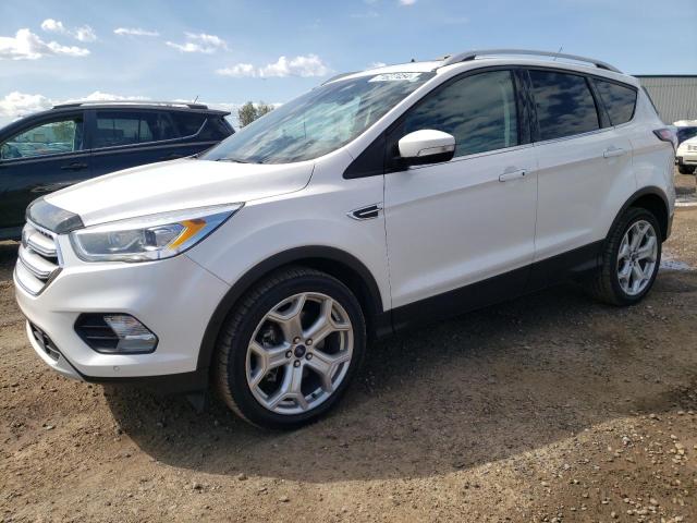FORD ESCAPE TIT 2017 with VIN 1FMCU9J97HUB54885 - Photo from auction