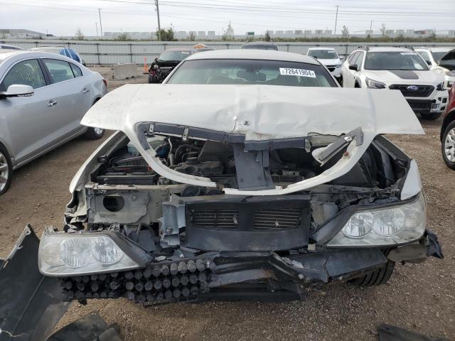 Photo 5 from auction – 2004 LINCOLN TOWN CAR U with VIN 1LNHM83W24Y629932
