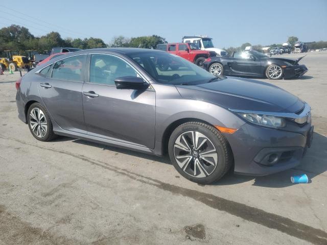 Photo 4 from auction – 2016 HONDA CIVIC EXL with VIN 2HGFC1F74GH652221