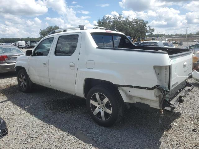 Photo 2 from auction – 2014 HONDA RIDGELINE with VIN 5FPYK1F61EB013239