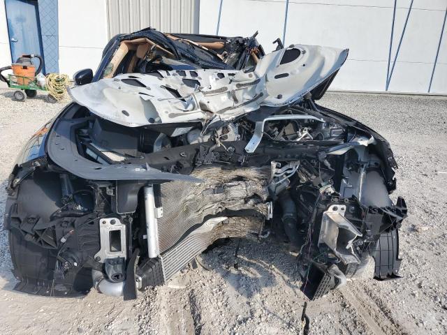 Photo 5 from auction – 2022 GENESIS G70 BASE with VIN KMTG34TA4NU097920