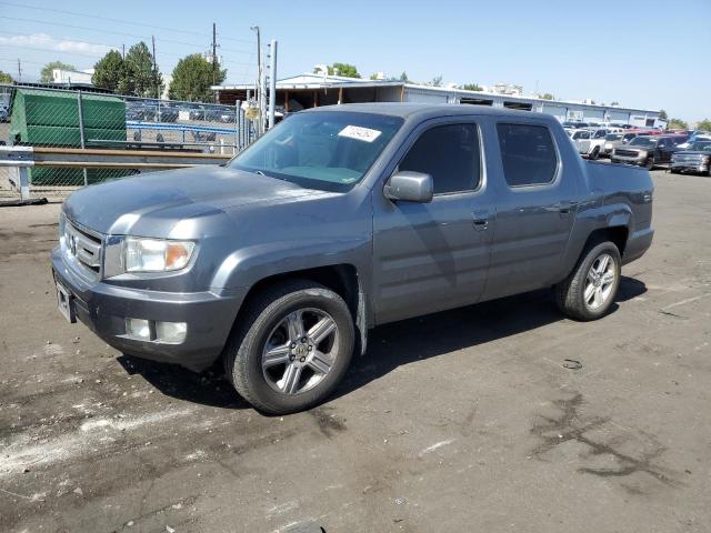 HONDA RIDGELINE 2011 with VIN 5FPYK1F57BB006380 - Photo from auction